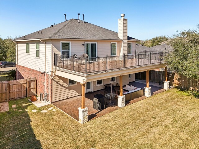 14 Carmel Chase Ct, Manvel, TX 77578 - rear view of property with a chimney, a patio area, and a wooden deck