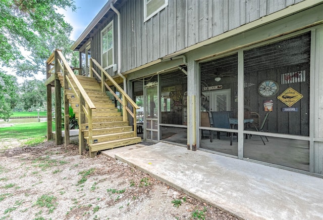 134 Private Road 652, Sargent, TX 77414 - view of patio featuring stairway and a sunroom