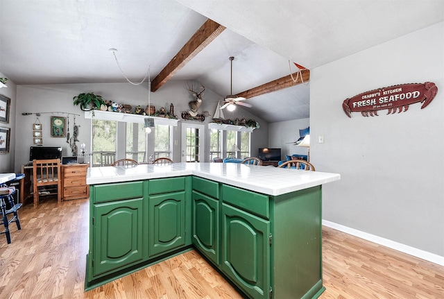 134 Private Road 652, Sargent, TX 77414 - kitchen featuring light wood-style flooring, tile countertops, ceiling fan, and green cabinetry