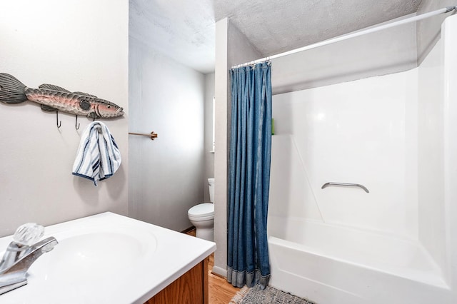 134 Private Road 652, Sargent, TX 77414 - full bath with shower / bath combo, toilet, vanity, and wood finished floors
