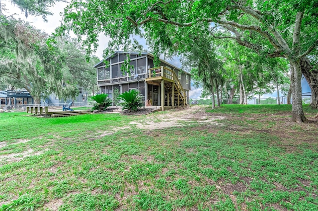 134 Private Road 652, Sargent, TX 77414 - view of yard featuring a sunroom, a deck, and stairway