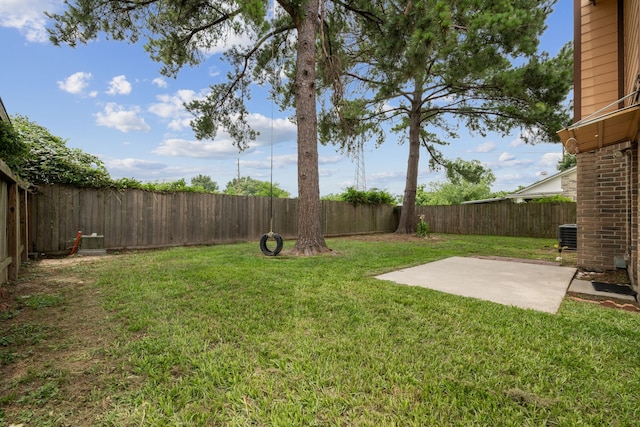 12115 Essenbruk Dr, Houston, TX 77066 - view of yard with a patio area and central AC