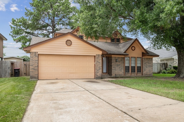 12115 Essenbruk Dr, Houston, TX 77066 - view of front of home featuring brick siding, driveway, an attached garage, and roof with shingles