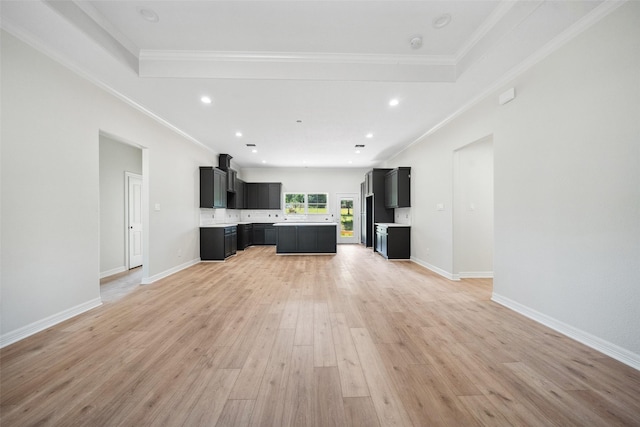 190 Faulkner Ave, Coldspring, TX 77331 - unfurnished living room with light wood finished floors, ornamental molding, recessed lighting, and baseboards