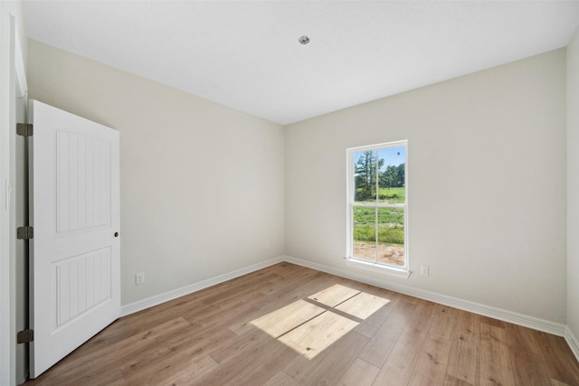 190 Faulkner Ave, Coldspring, TX 77331 - unfurnished room featuring baseboards and wood finished floors