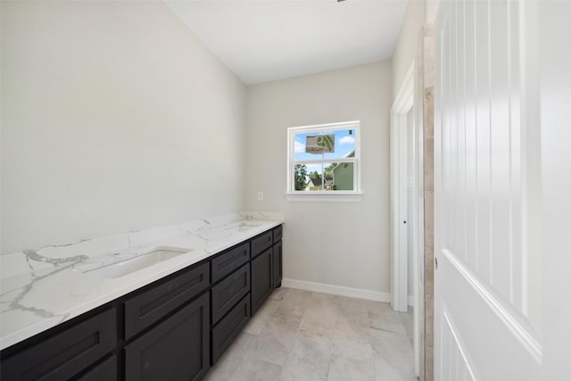 190 Faulkner Ave, Coldspring, TX 77331 - bathroom with double vanity and baseboards