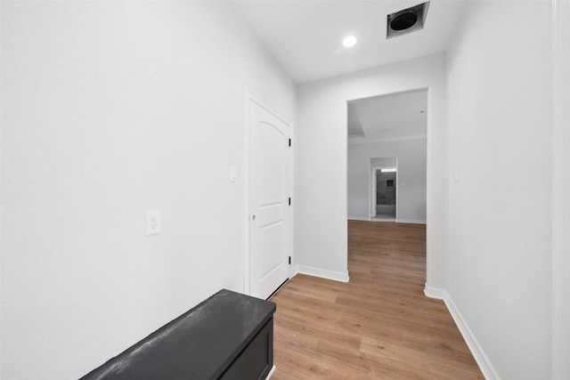 190 Faulkner Ave, Coldspring, TX 77331 - corridor with baseboards, light wood finished floors, and recessed lighting