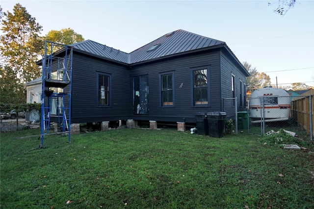 2215 Kane St, Houston, TX 77007 - back of house with metal roof