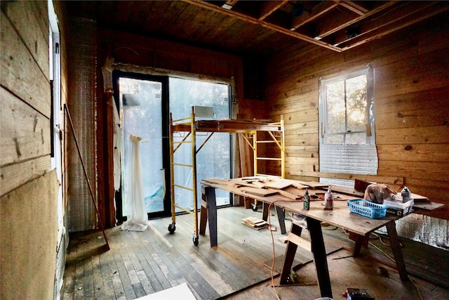 2215 Kane St, Houston, TX 77007 - miscellaneous room featuring wood walls and hardwood / wood-style flooring