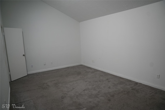 8803 Vinkins Rd, Houston, TX 77071 - carpeted spare room with lofted ceiling and baseboards