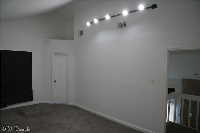 8803 Vinkins Rd, Houston, TX 77071 - unfurnished room featuring carpet flooring, baseboards, and high vaulted ceiling