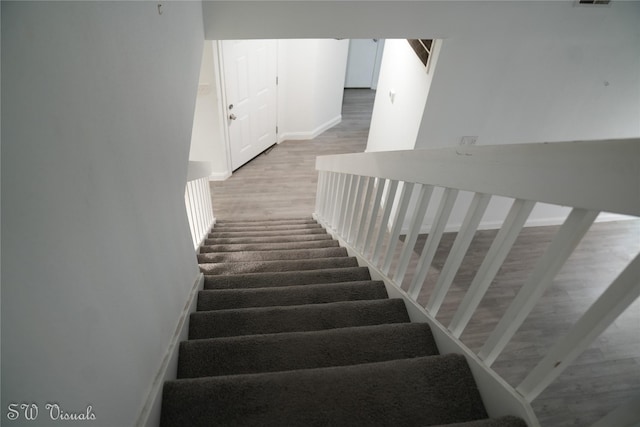 8803 Vinkins Rd, Houston, TX 77071 - stairs featuring wood finished floors and baseboards