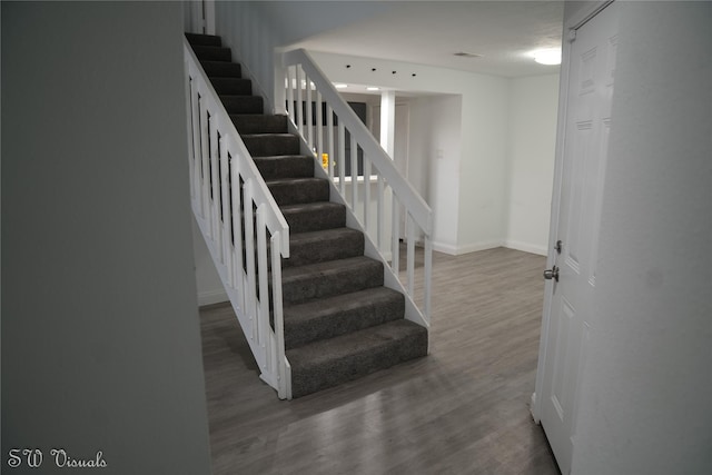 8803 Vinkins Rd, Houston, TX 77071 - staircase with wood finished floors and baseboards