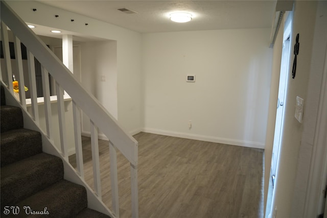 8803 Vinkins Rd, Houston, TX 77071 - stairway featuring wood finished floors and baseboards