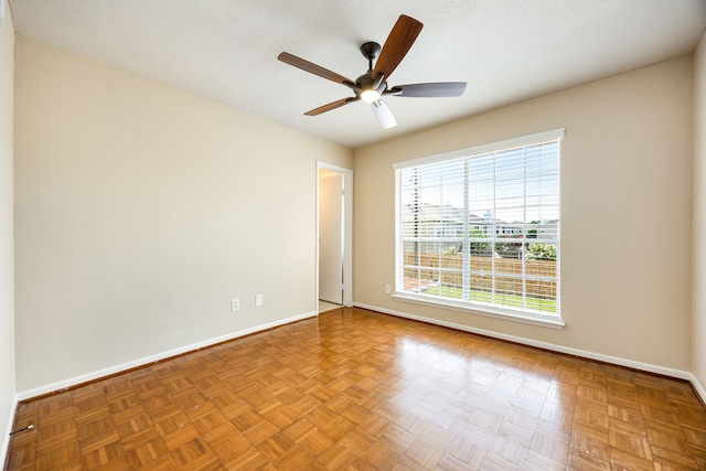 7575 Cambridge St Unit 1604, Houston, TX 77054 - unfurnished room featuring baseboards and ceiling fan
