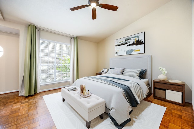 7575 Cambridge St Unit 1604, Houston, TX 77054 - bedroom with vaulted ceiling, a ceiling fan, and baseboards