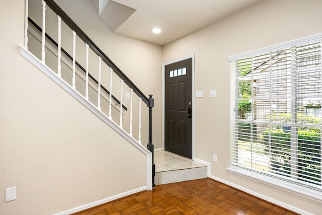 7575 Cambridge St Unit 1604, Houston, TX 77054 - foyer entrance with baseboards and stairs