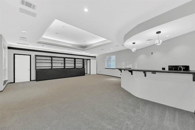 5122 Braesheather Dr, Houston, TX 77096 - interior space with light carpet, a raised ceiling, and recessed lighting