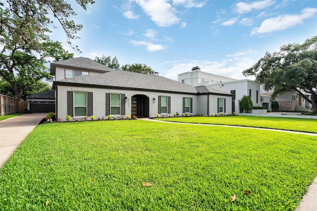 5122 Braesheather Dr, Houston, TX 77096 - view of front of property featuring roof with shingles and brick siding