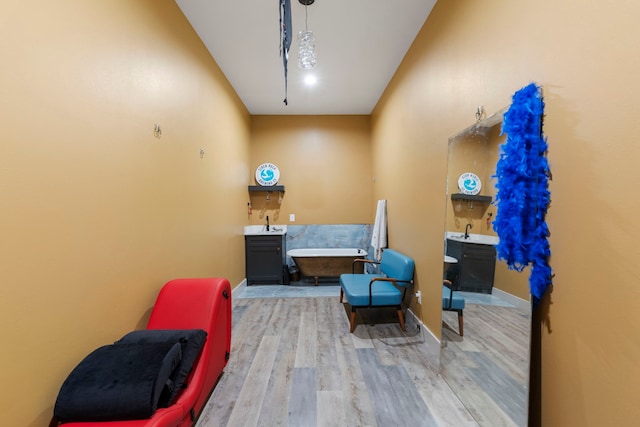 17131 Carrol Ln, Willis, TX 77378 - bedroom featuring wood finished floors, wet bar, and baseboards