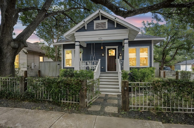 826 Omar St, Houston, TX 77009 - shotgun-style home featuring covered porch