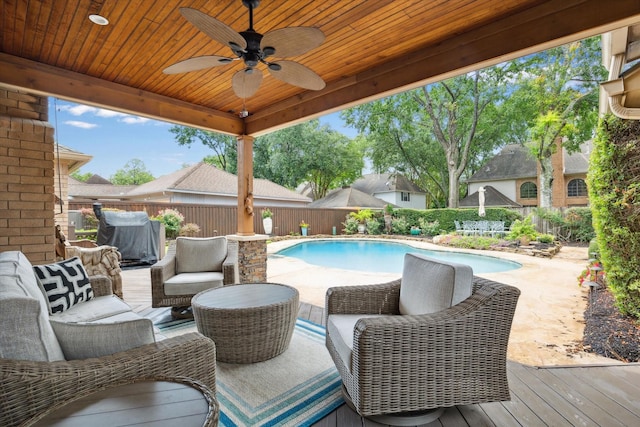 15927 Meadowside Dr, Houston, TX 77062 - view of swimming pool with a fenced backyard, a ceiling fan, grilling area, an outdoor living space, and a wooden deck