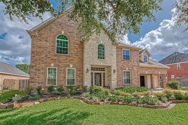 13311 Barbstone Dr, Houston, TX 77044 - view of front of home featuring brick siding and stone siding