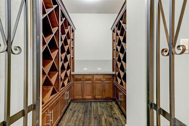 4247 Dickson St, Houston, TX 77007 - wine cellar with dark wood-style flooring
