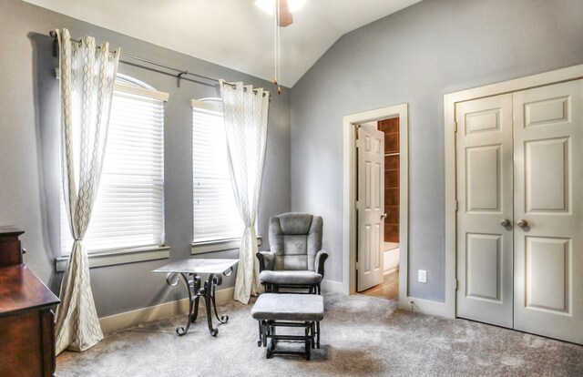 4247 Dickson St, Houston, TX 77007 - living area with vaulted ceiling, carpet, baseboards, and ceiling fan