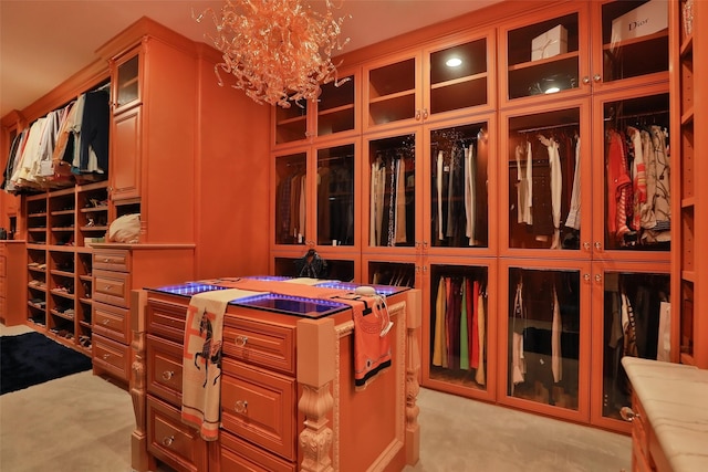 17122 Ashley Woods Ct, Spring, TX 77379 - spacious closet featuring light carpet and a chandelier