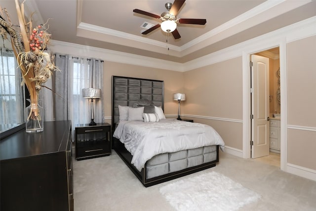 17122 Ashley Woods Ct, Spring, TX 77379 - bedroom with a tray ceiling, light carpet, multiple windows, crown molding, and a ceiling fan