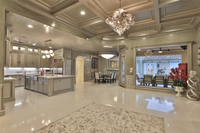 17122 Ashley Woods Ct, Spring, TX 77379 - building lobby featuring coffered ceiling, crown molding, beam ceiling, recessed lighting, and a sink