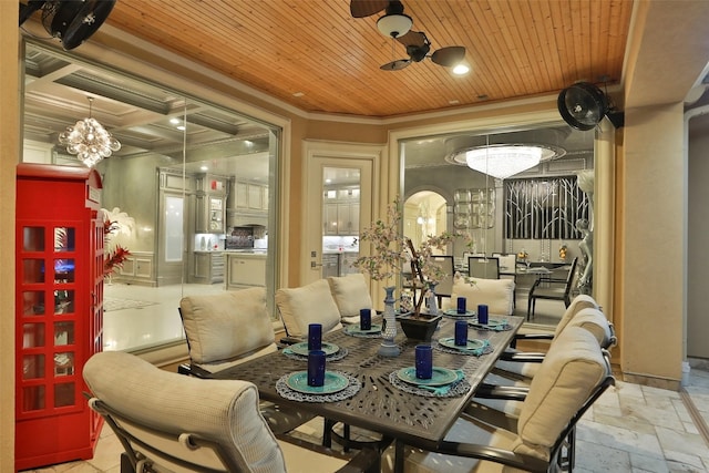 17122 Ashley Woods Ct, Spring, TX 77379 - dining space with crown molding, a chandelier, wooden ceiling, and stone tile flooring
