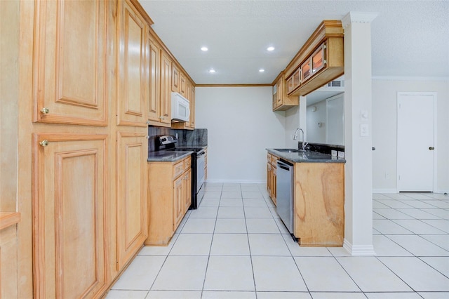 12028 Mighty Oak Dr Unit A, Houston, TX 77066 - kitchen with stainless steel appliances, a sink, light tile patterned floors, crown molding, and baseboards