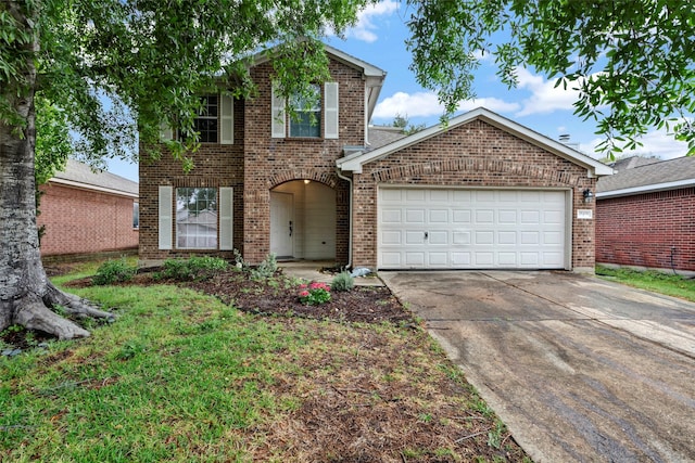 25430 Twister Trl, Spring, TX 77373 - traditional-style house featuring driveway, brick siding, and an attached garage