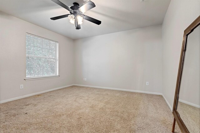 25430 Twister Trl, Spring, TX 77373 - unfurnished room with carpet floors, a ceiling fan, and baseboards
