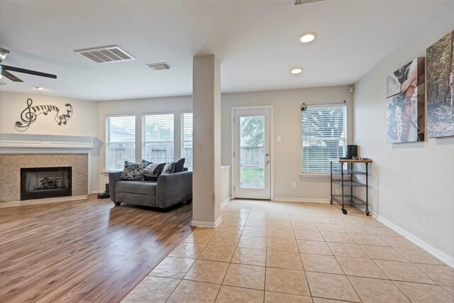 25430 Twister Trl, Spring, TX 77373 - living area with healthy amount of natural light, a ceiling fan, baseboards, and recessed lighting