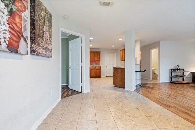 25430 Twister Trl, Spring, TX 77373 - unfurnished living room with recessed lighting, baseboards, and light tile patterned floors