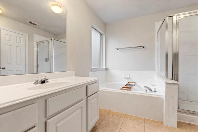 25430 Twister Trl, Spring, TX 77373 - full bath featuring a shower stall, vanity, a bath, and tile patterned floors