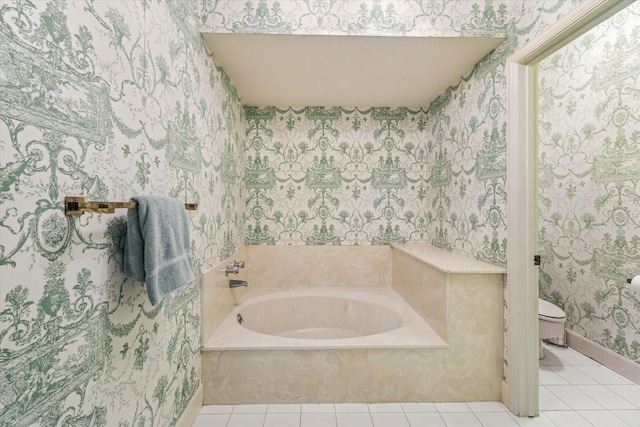 7 Pine Briar Cir, Houston, TX 77056 - full bathroom with wallpapered walls, a bath, toilet, tile patterned flooring, and baseboards