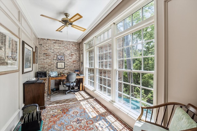 7 Pine Briar Cir, Houston, TX 77056 - home office featuring brick wall, crown molding, a ceiling fan, and healthy amount of natural light