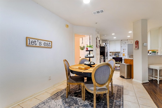 14639 Cypress Cottage Ct, Cypress, TX 77429 - dining room with light tile patterned floors, recessed lighting, and baseboards