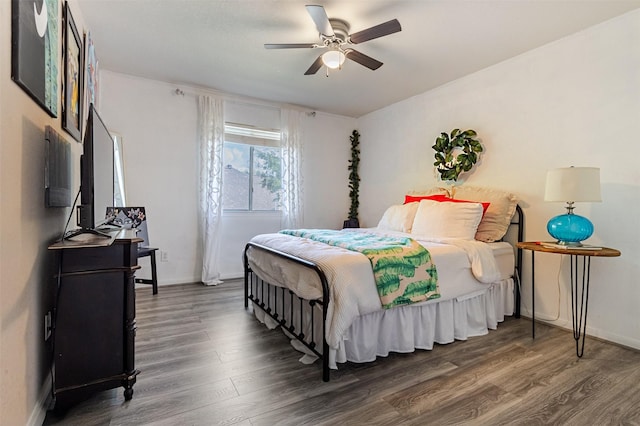 14639 Cypress Cottage Ct, Cypress, TX 77429 - bedroom featuring wood finished floors, baseboards, and ceiling fan