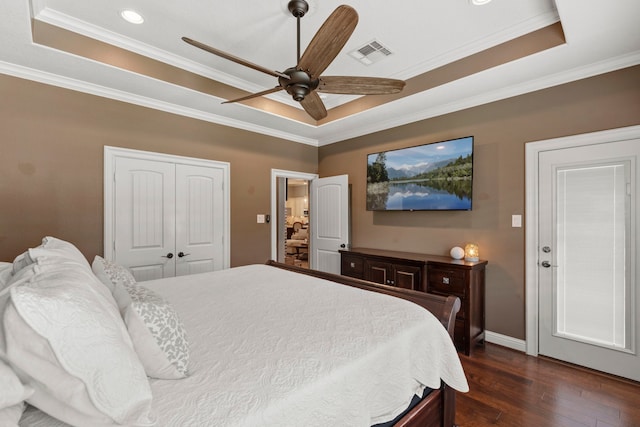 6014 Charrington Dr, Spring, TX 77389 - bedroom featuring a raised ceiling, dark wood-style floors, crown molding, baseboards, and recessed lighting