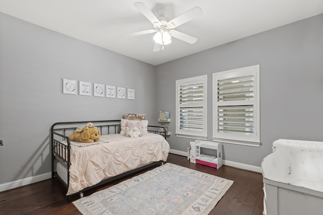 6014 Charrington Dr, Spring, TX 77389 - bedroom with wood finished floors, baseboards, and a ceiling fan