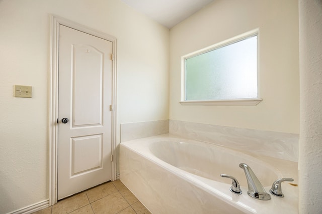 40614 Rolling Forest Dr, Magnolia, TX 77354 - full bathroom featuring a garden tub and tile patterned flooring