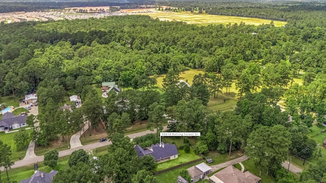 40614 Rolling Forest Dr, Magnolia, TX 77354 - aerial overview of property's location featuring a forest