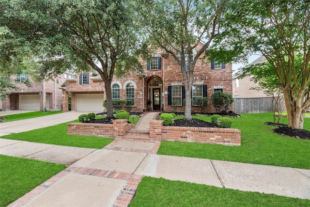 12415 Bunker Cove Dr, Cypress, TX 77433 - view of front of property with driveway, a garage, and brick siding