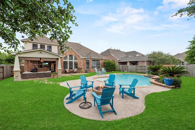 12415 Bunker Cove Dr, Cypress, TX 77433 - view of pool featuring an outdoor living space with a fire pit and a patio