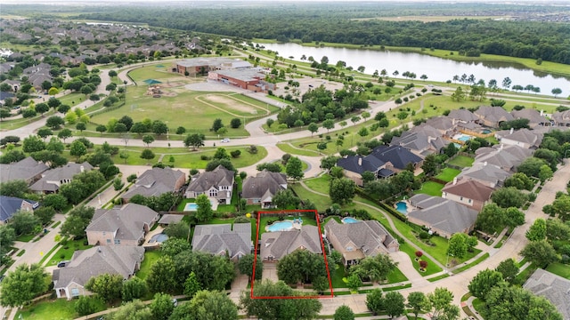 12415 Bunker Cove Dr, Cypress, TX 77433 - aerial view of residential area with a large body of water and property parcel outlined